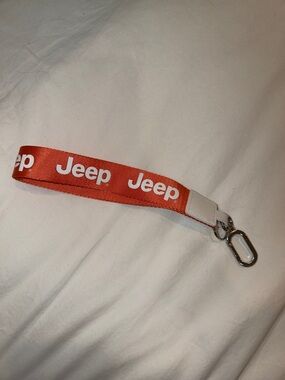 Jeep Bright Orange Logo Wrist Strap Keychain (NWOT)